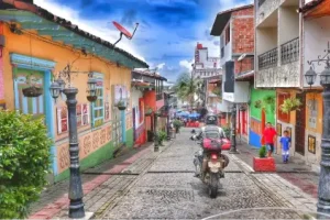 colorful-colombia-village-street-motorcycle